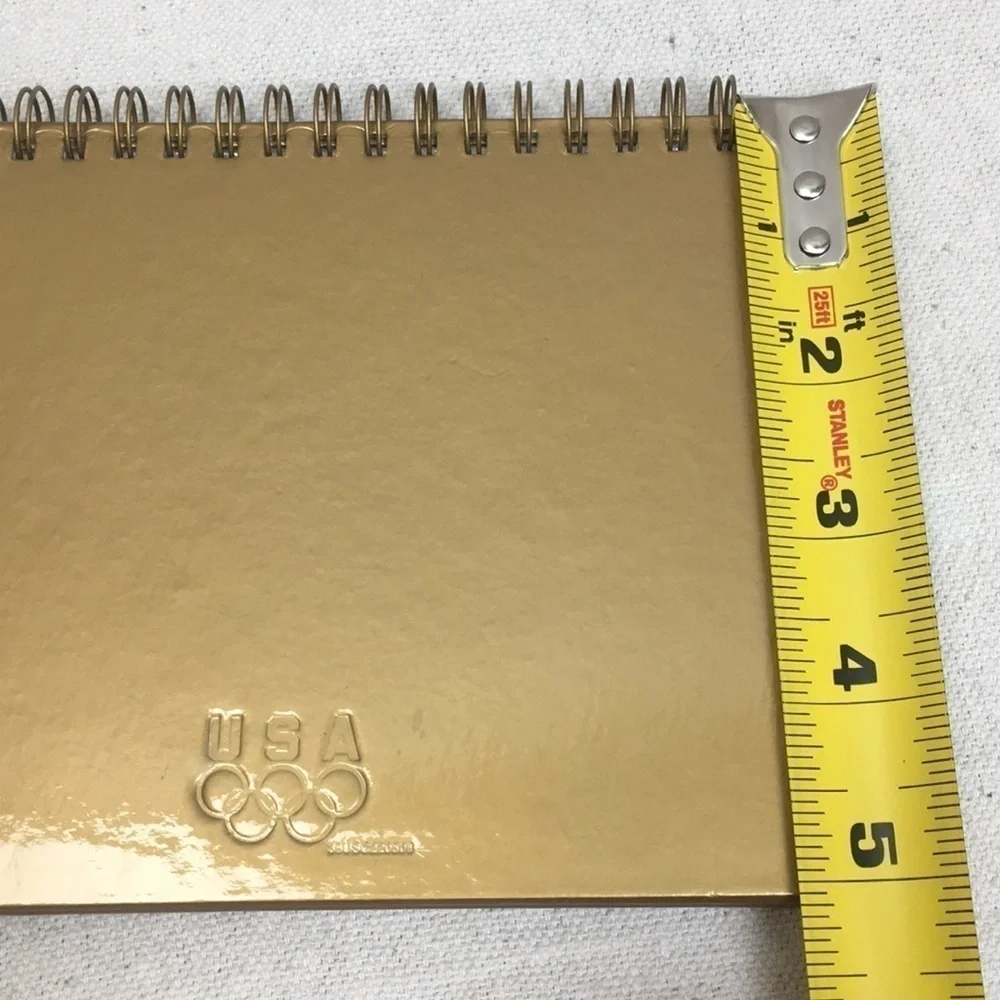 Spiral bound Olympic photo album/frame